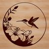 Floral Hummingbird Design A detailed vector design of a hummingbird surrounded by foliage and flowers.