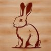 A sitting rabbit in a simple design, suitable for various applications including digital art and craft projects.