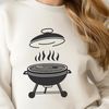 Summer BBQ Setup Vector Design Vector graphic design of a backyard BBQ setup with cooking equipment.