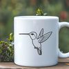 Floral Beauty with a Feathered Friend Illustration of a hummingbird perched on a flower, created as vector art.