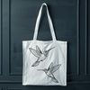 Flight-Ready Hummingbird Vector Graphic A detailed illustration of a hummingbird in flight, suitable for vector graphics and cutting machines.