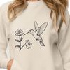 Free Floral Bird Illustration A colorful hummingbird perched on a floral branch, suitable for use in vector design projects.