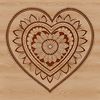 Intricately patterned heart design created using vector art principles.