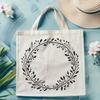 A decorative floral wreath made up of intertwined flowers and foliage.