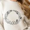 Intricate Wreath SVG Graphics A floral design featuring an intricate wreath made from various elements.