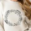 SVG Wreath Design with Intricate Patterns A decorative SVG wreath template featuring intricate floral patterns, ideal for use in digital crafts and commercial artwork.