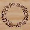 A floral wreath designed as a vector graphic, ideal for digital and laser cutting applications.