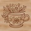 A white ceramic cup with a floral design pattern on the side, suitable for drawing or laser cutting.