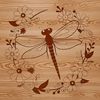 A detailed illustration of a dragonfly with iridescent wings and a long slender body.