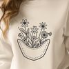 An editable vector design featuring a floral pocket motif with various line styles.