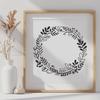 Elegant Floral Pattern Wreath A floral wreath design made up of intricate patterns and shapes.