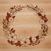 Free Floral Wreath SVG Design for Cutting Machines A floral wreath design created as a scalable vector graphic (SVG) for cutting machine projects.