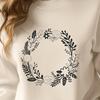 Digital Floral Garland SVG File A digital floral wreath design with intricate details, suitable for vector art projects.