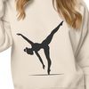 Beautiful Balance Beam Routine A female gymnast in mid-air, executing a flip on the balance beam.