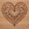 A colorful geometric mandala heart design made up of interlocking shapes.