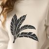 An illustration of a single green leaf with detailed veins, suitable for vector design projects.