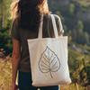 A detailed outline of a green leaf with pointed tips and veins, suitable for graphic design projects.
