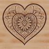 A intricate mandala design featuring a heart shape, perfect for vector art and cutting machine templates.