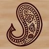 A stylized paisley pattern used as an embellishment in graphic design and digital crafts.