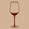 A red wine bottle in a glass on a wooden table.
