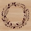 An illustration of a decorative floral wreath, suitable for use with cutting machines like Cricut or laser cutters.