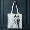 A bride and groom standing together in formal attire, with a subtle background pattern.