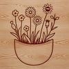 A hand-drawn vector illustration of a floral pocket design featuring intricate wild flowers.