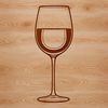 A glass of red wine with a cork on the side.
