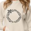 A floral wreath designed in vector art for use as a template in graphic design software.