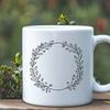 A hand-drawn floral wreath design made from intertwined stems and leaves, suitable for digital crafting.