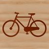 A simple illustration of a bicycle with bold lines and minimal details.