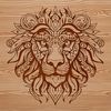 Majestic Lion Face Illustration with Bold Lines An ornate design of a big cat's face with bold lines and textures.