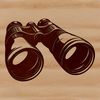 A pair of binoculars used for observing wildlife in the outdoors during a camping trip.