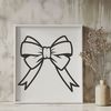 Elegant Bow Decoration A decorative bow graphic design element with intricate details.