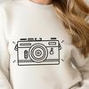 A digital camera with interchangeable lenses, highlighting the intersection of photography and technology.