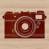 Modern Camera Icon A stylized illustration of a digital camera with lens and viewfinder.