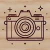 Free Camera Vector Icon A digital camera with lens and viewfinder in a sleek design, suitable for vector art and graphic design projects.