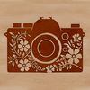 Floral Camera Design Vector illustration of a camera with a floral pattern background