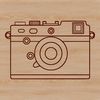 Camera Silhouette Icon A simple line drawing of a camera, symbolizing photography technology.