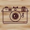 Free Camera Icon A simple line drawing illustration of a camera, suitable for vector art projects and designs.