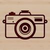 A digital camera icon made from simple shapes and lines, suitable for use in technology and photography projects.