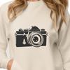 A digital camera illustration with a minimalist design, suitable for vector graphics.