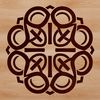 An intricate ornate Celtic pattern featuring interconnected shapes and motifs in a traditional style.