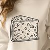 A wedge of colorful cheese A simple, colorful illustration of a wedge-shaped cheese with rounded edges.