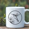 Free Vector Hummingbird Clip Art Design A colorful hummingbird perched on a flower, ideal for vector art designs.