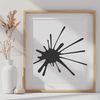 A colorful splat shape with a fun, playful design, suitable for clip art projects.