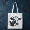 Free Cows Clipart Graphics A detailed illustration of a cow's head with a simple background, suitable for various graphic design and craft projects.
