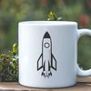 Futuristic Spacecraft Silhouette A futuristic spacecraft with sleek lines and engines blasting off into the galaxy.