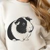 Free Pet SVG Clip Art An illustration of a guinea pig in a sitting position.