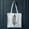 A single bird feather designed as a vector graphic.